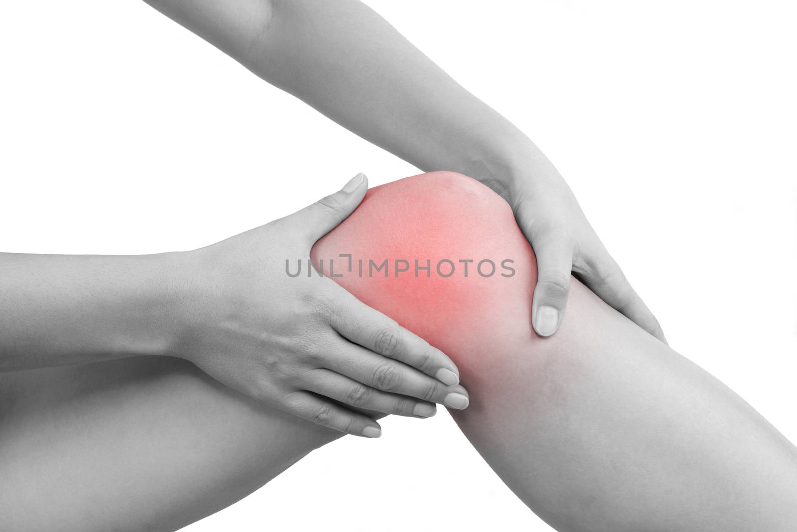 Beautiful female hand holding her knee with highlighted pain area isolated on white background.