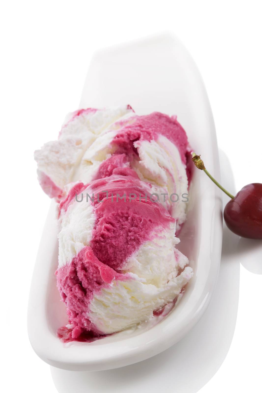 Cherry ice cream in bowl isolated on white background. Fruit ice cream eating. 