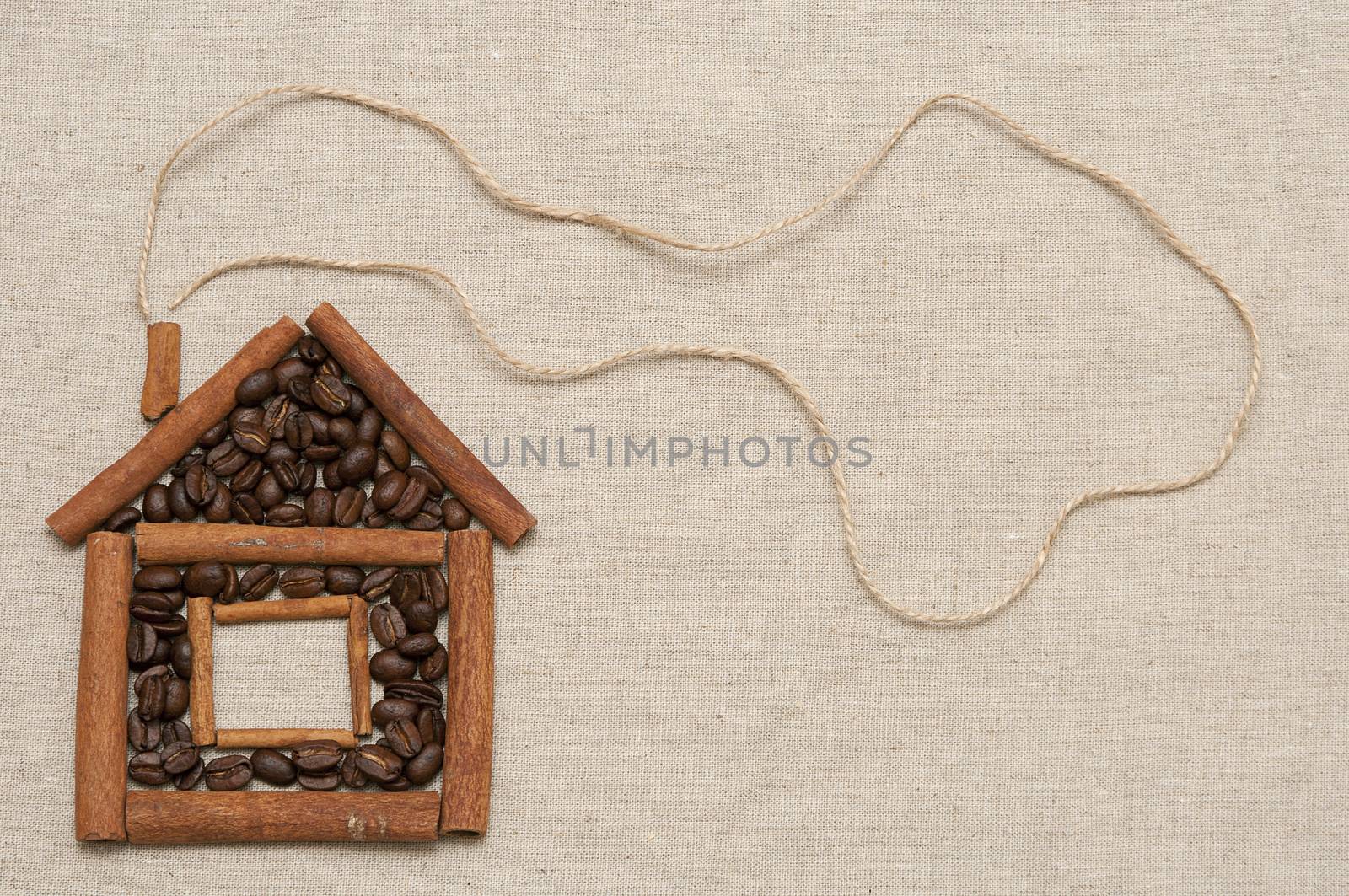 House made of cinnamon sticks and coffee beans