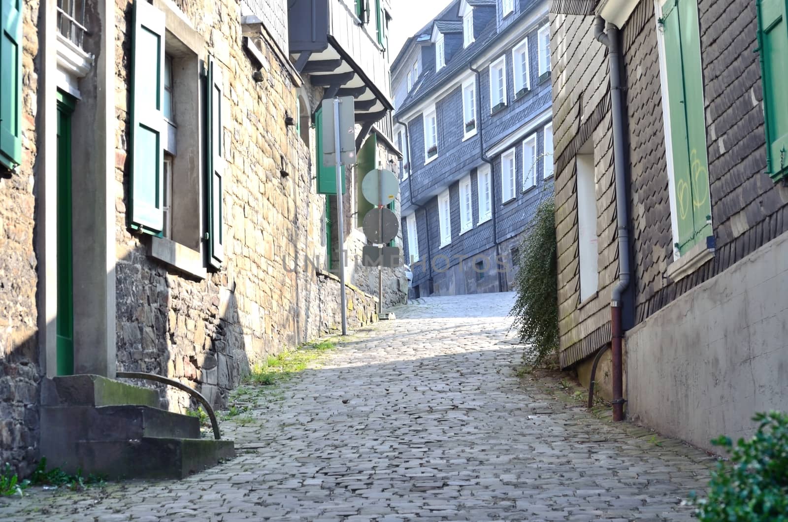 Old alley between half-timbered houses