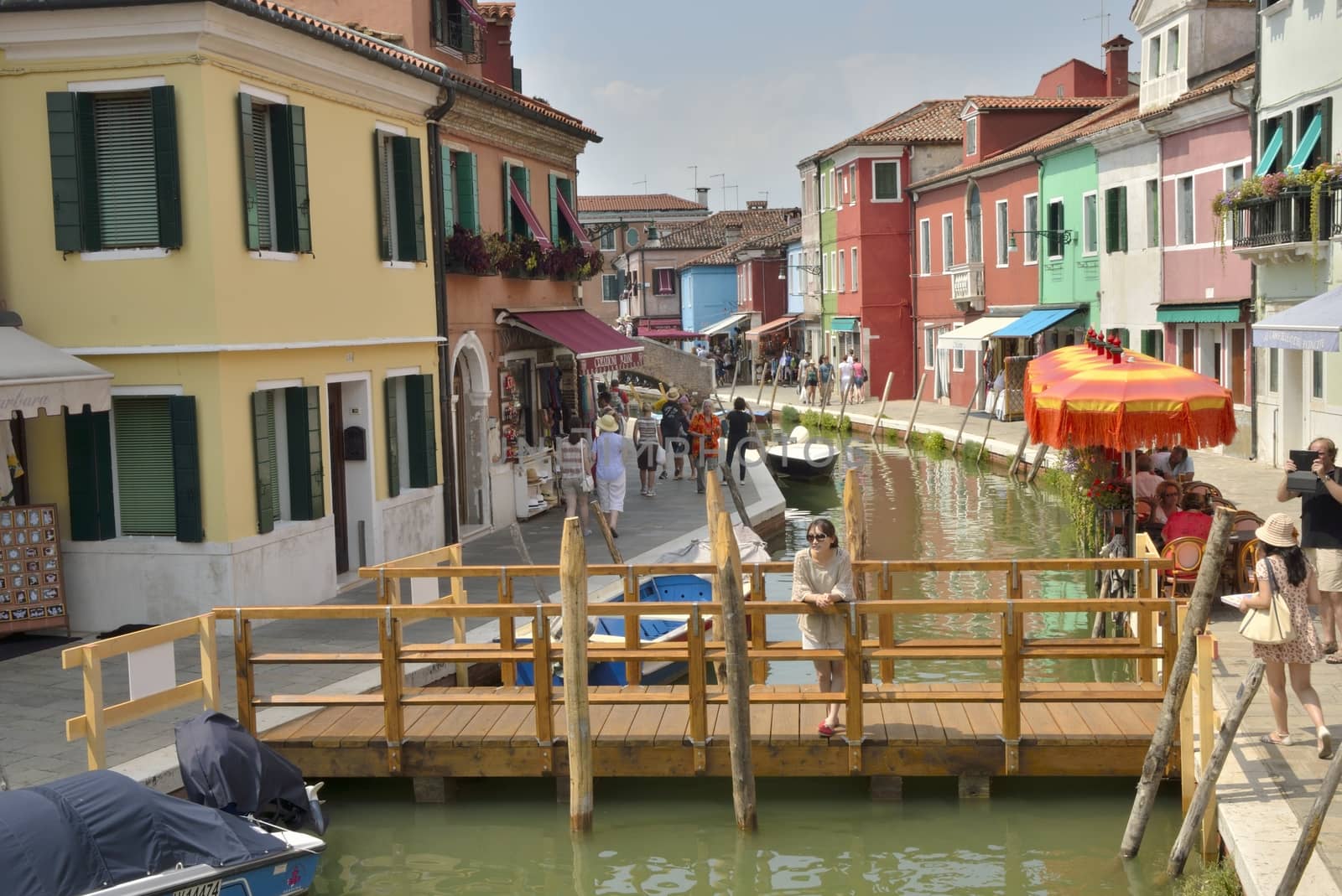 Canal  in Burano, a colorful island of Venice, Italy