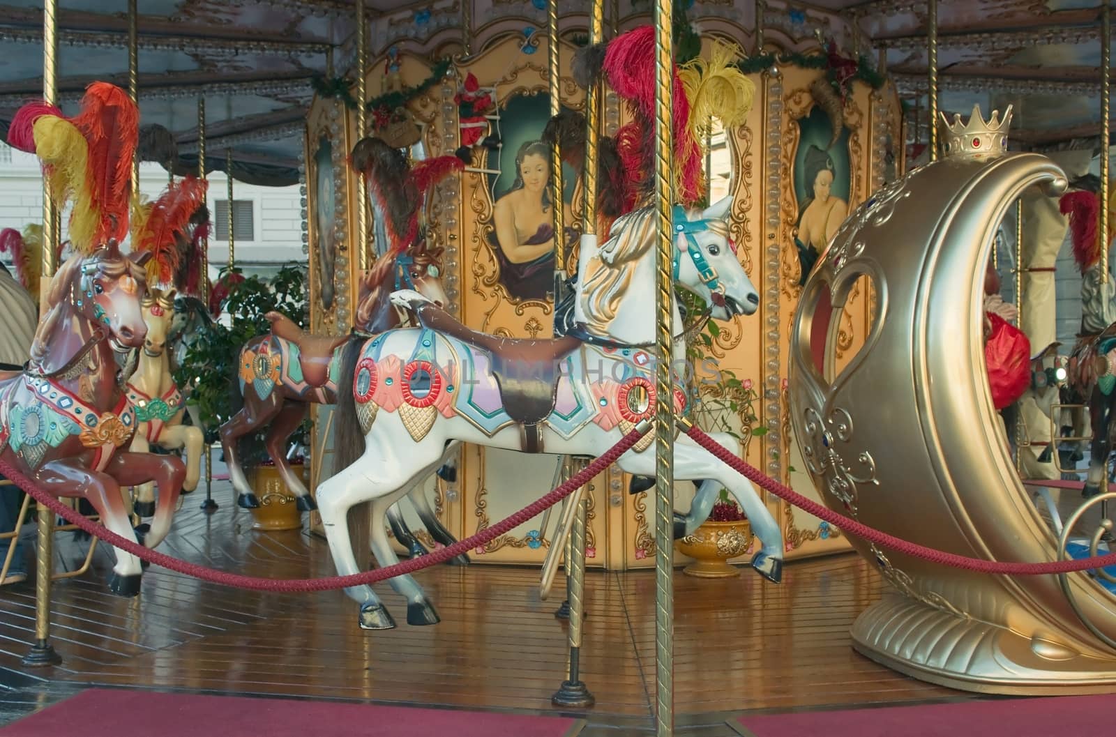 Carousel horses on a carousel in Florence in the Christmas holidays