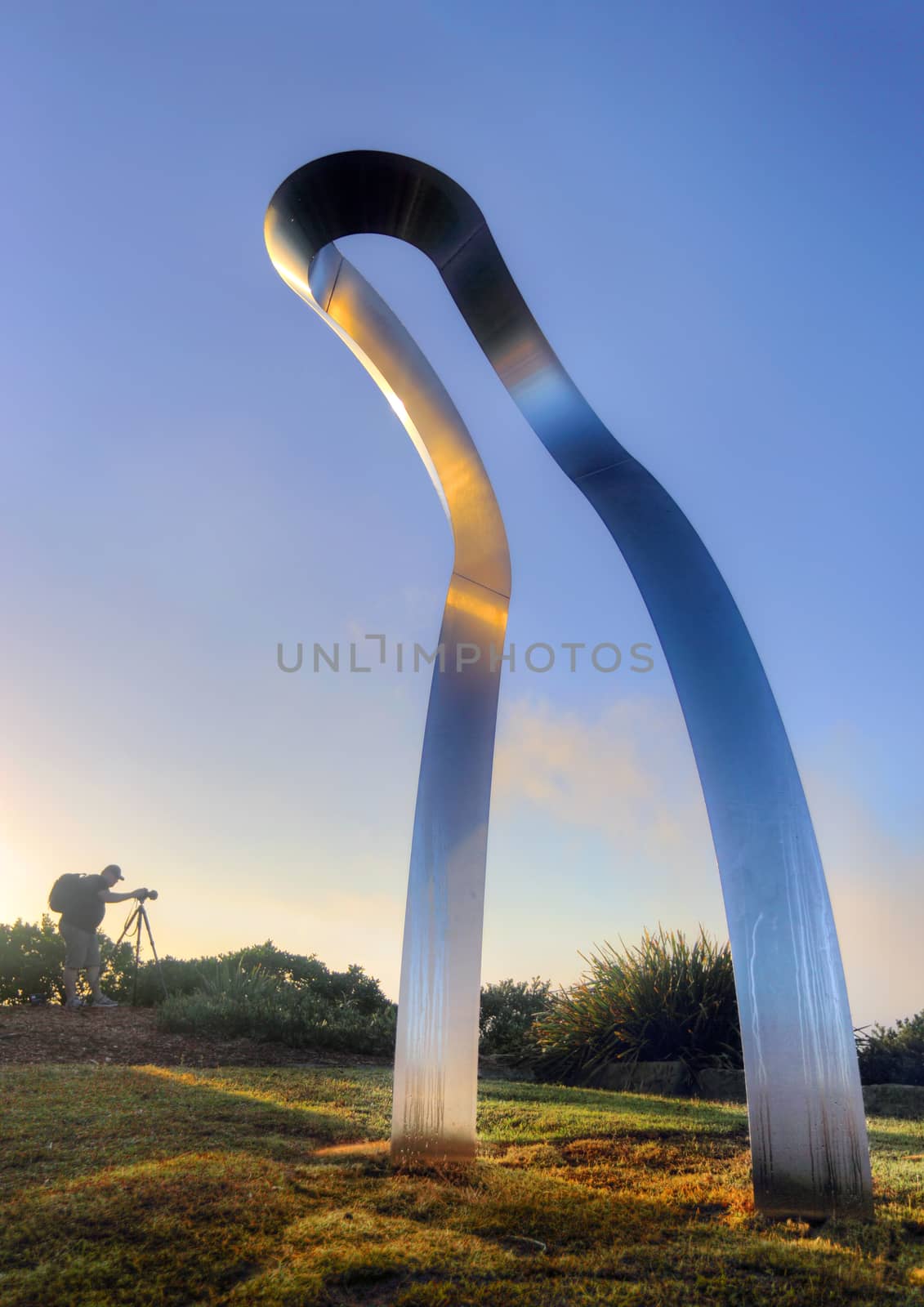 BONDI, AUSTRALIA - OCTOBER 25, 2014; Sculpture by the Sea Annual free public event 2014.  Exhibit titled Transfiguration Raise III   by artist MitsuoTakeuchi, Japan,