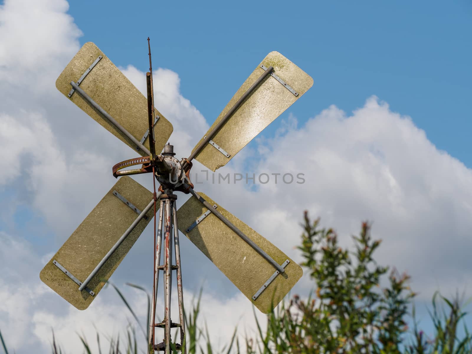 Closeup of old metal windmill in Dutch nature reserve Weerribben
