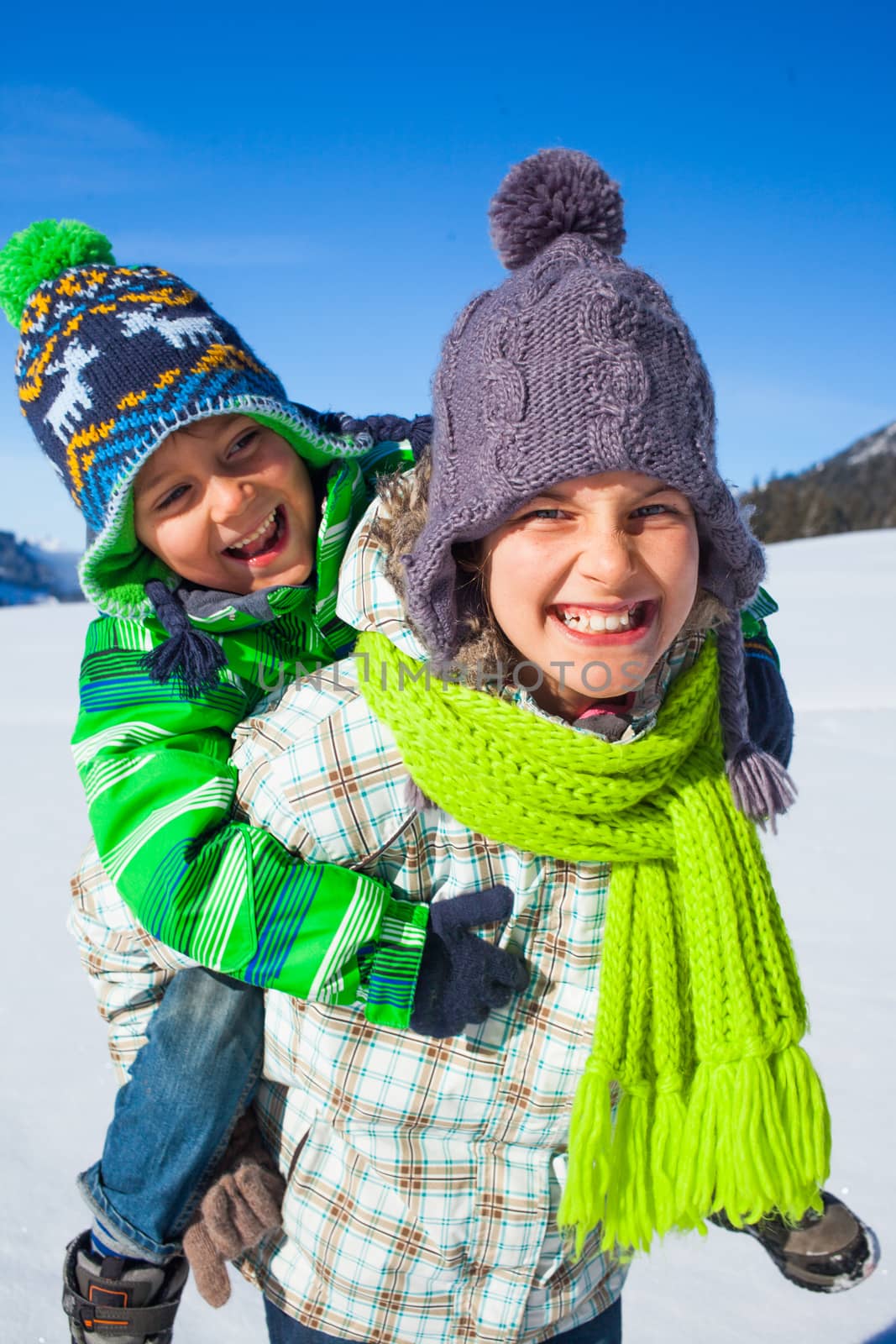 Happy kids playing winter by maxoliki