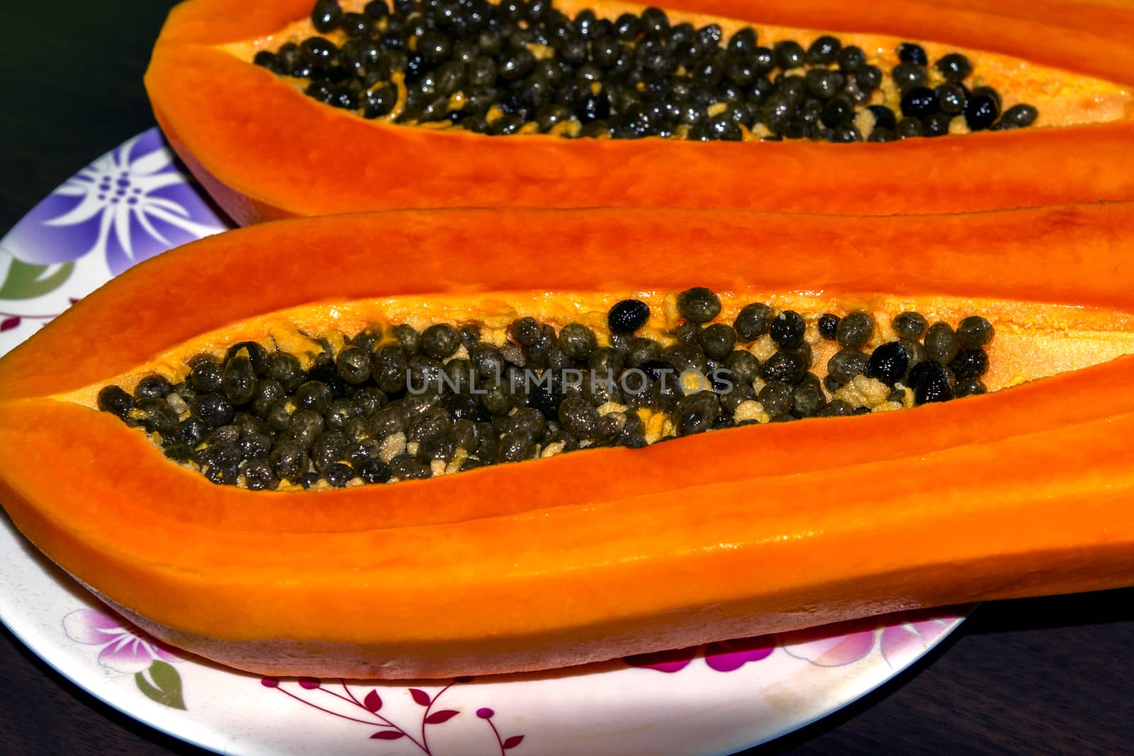 Ripe Papaya Seeds in cut of the fruit