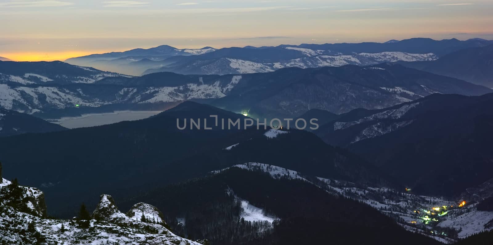 Evening lights from the mountains, Romanian Carpathians.