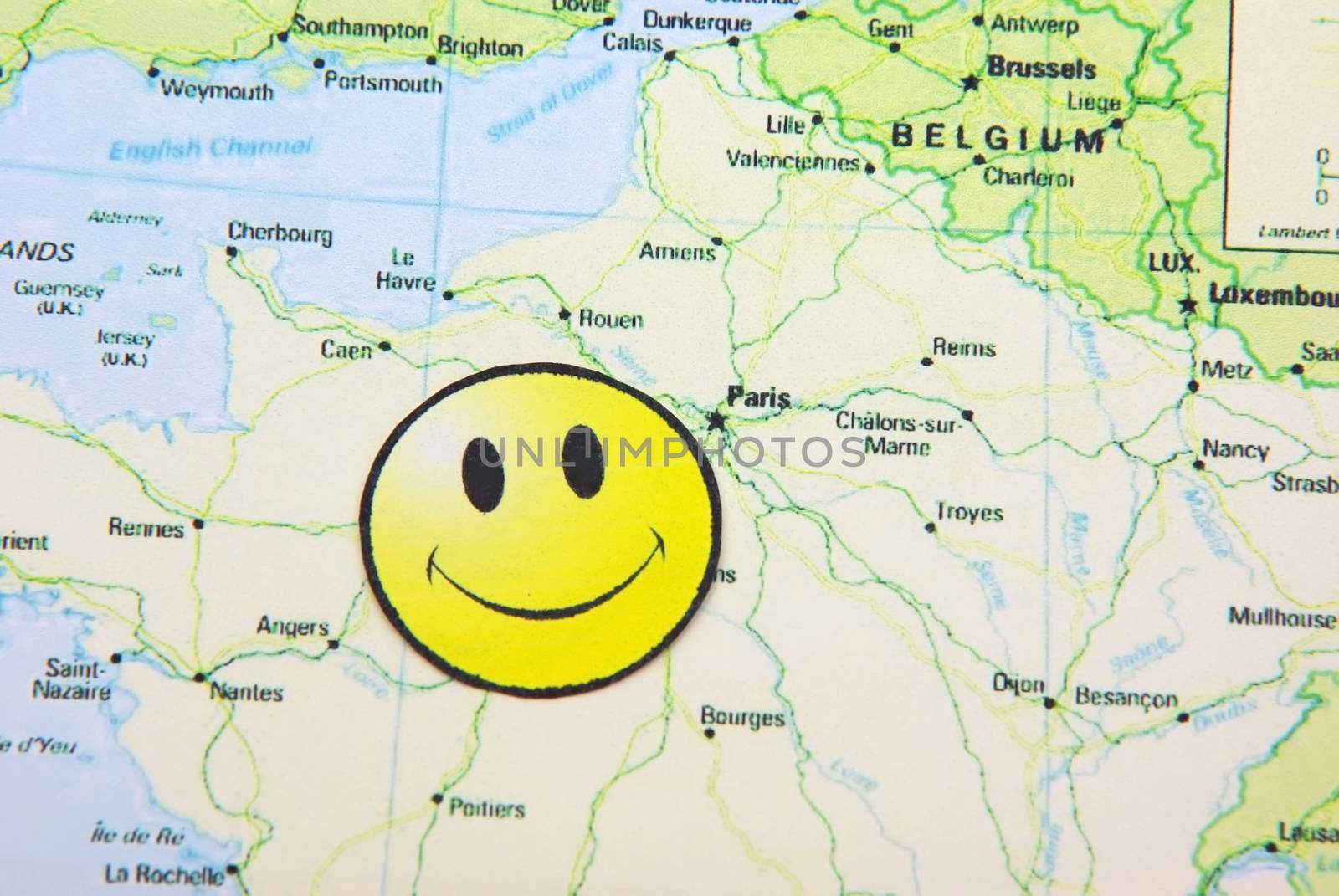 Close up image of a smile face on France map.
