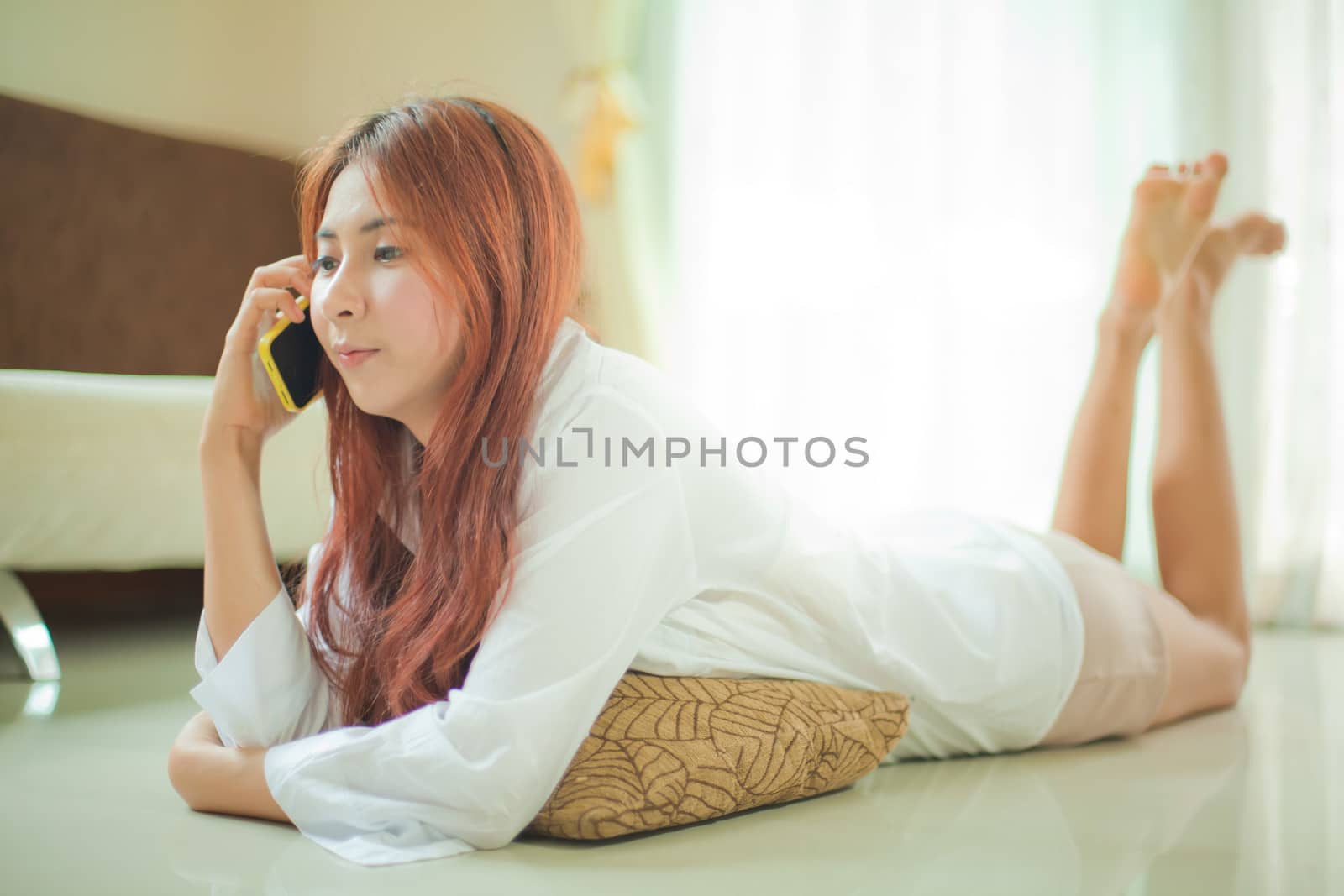 Young asian beautiful woman on the smart phone