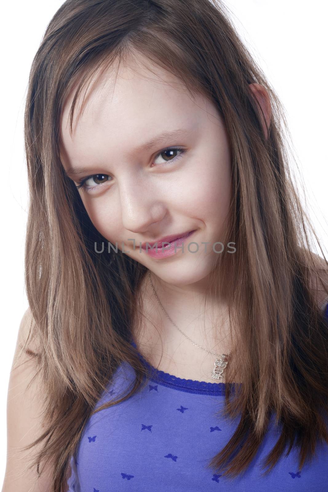 studio portrait of a pretty, eleven years old girl