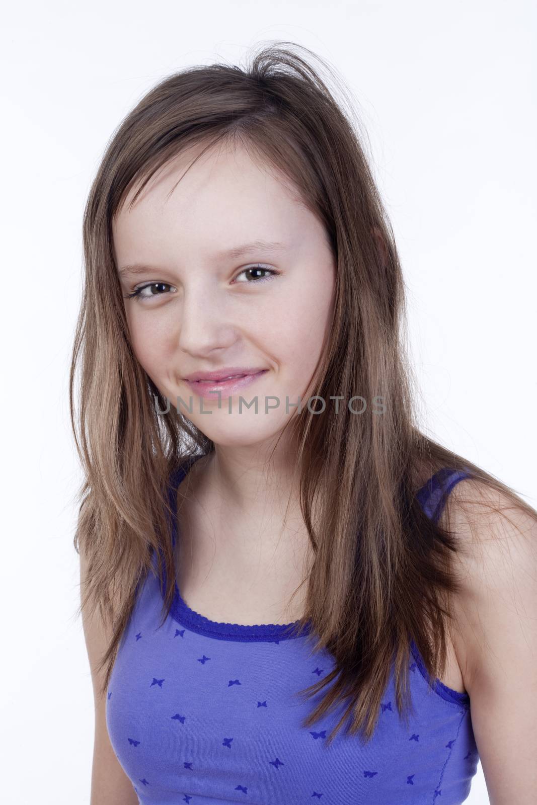 studio portrait of a pretty, eleven years old girl