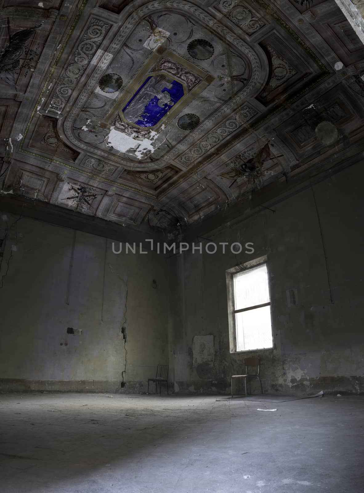 Interiors of an abandoned madhouse in the downtown by enrico.lapponi