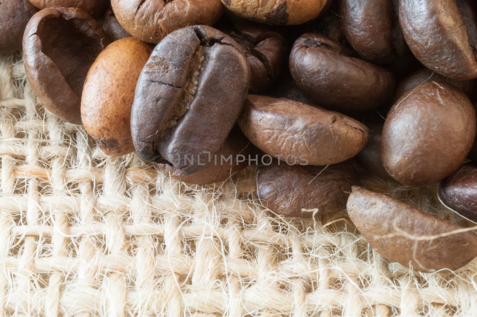 beautiful macro background of coffee with jute