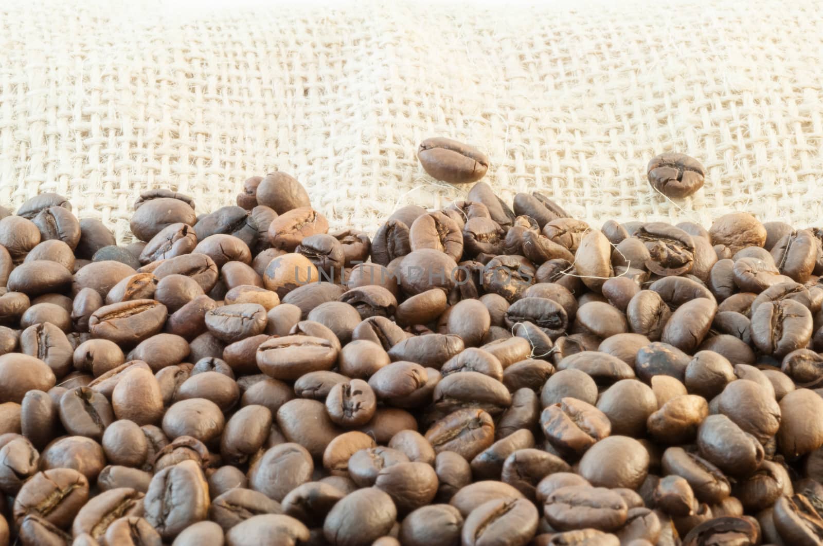 beautiful macro background of coffee with jute