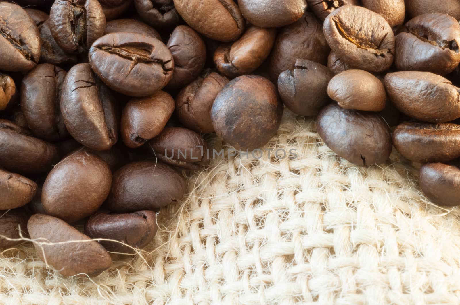 beautiful macro background of coffee with jute