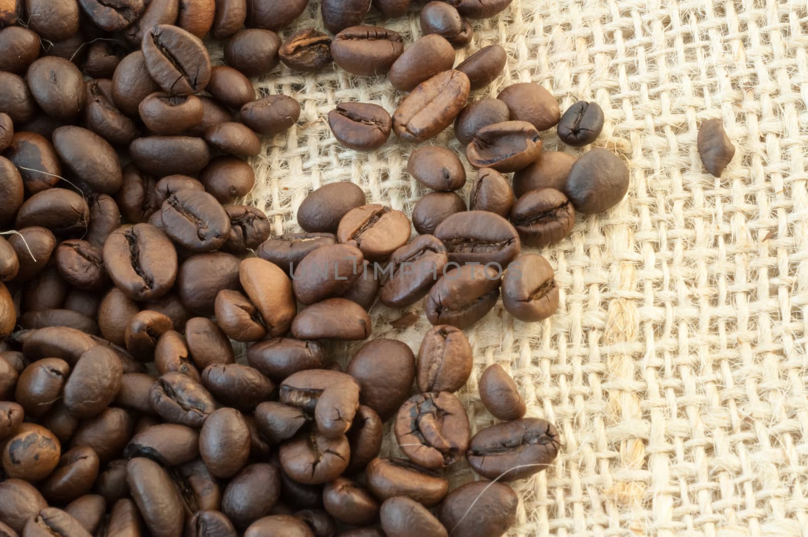 beautiful macro background of coffee with jute