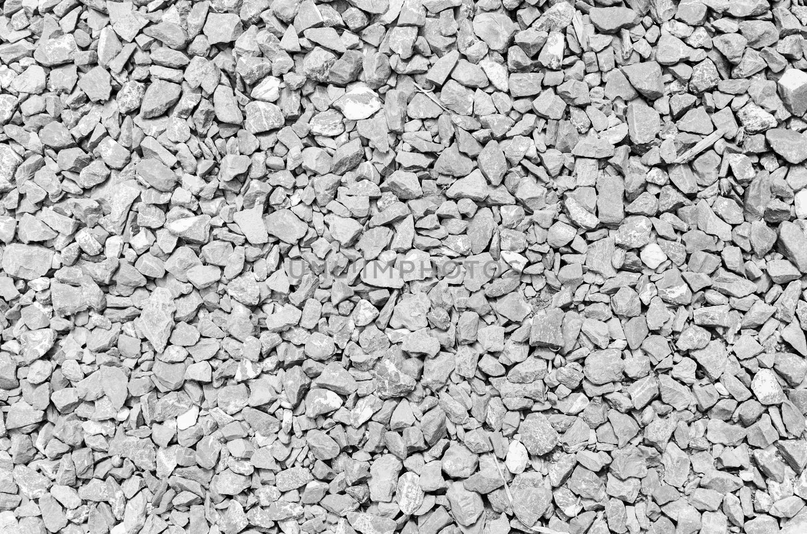 pebble black white stones background. closeup of stones texture, monotone