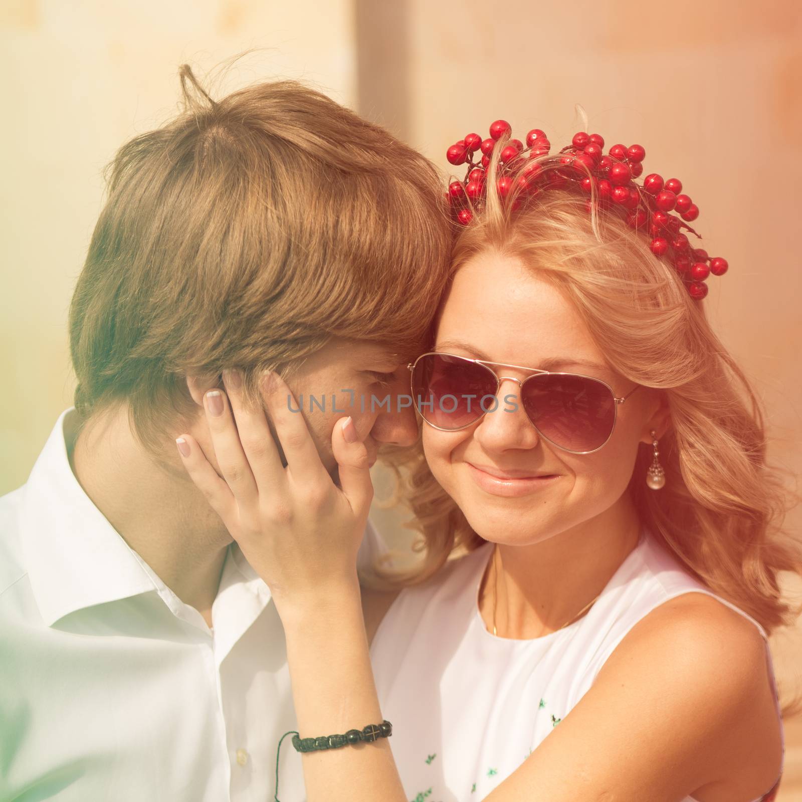 Beautiful wedding couple is enjoying wedding in the sun. 