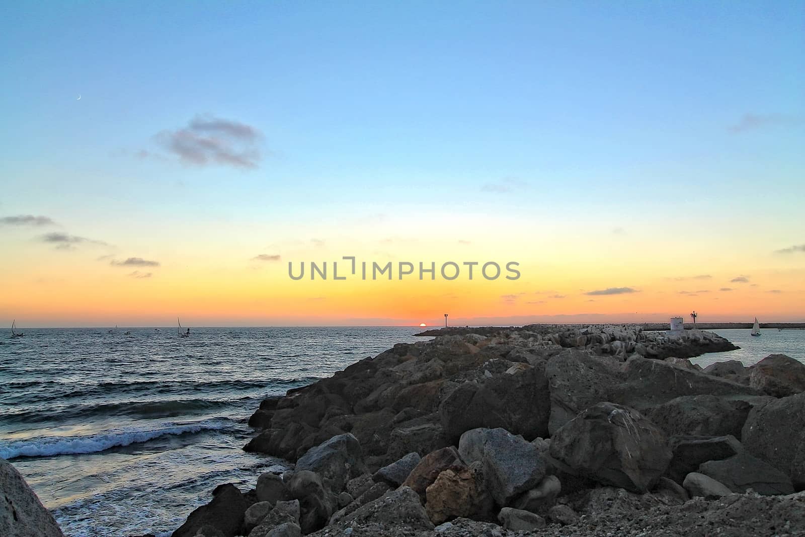 Sunset on the beach and rocks by Timmi