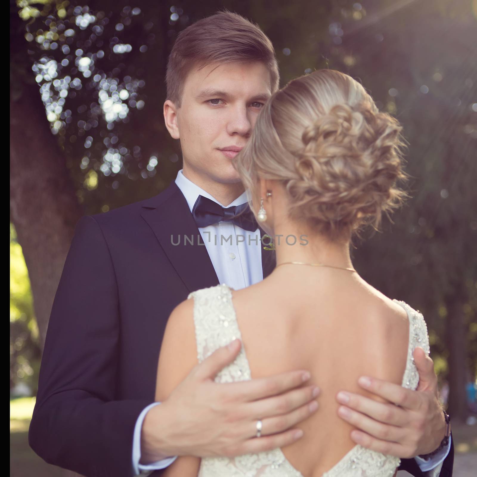 Beautiful wedding couple by sarymsakov