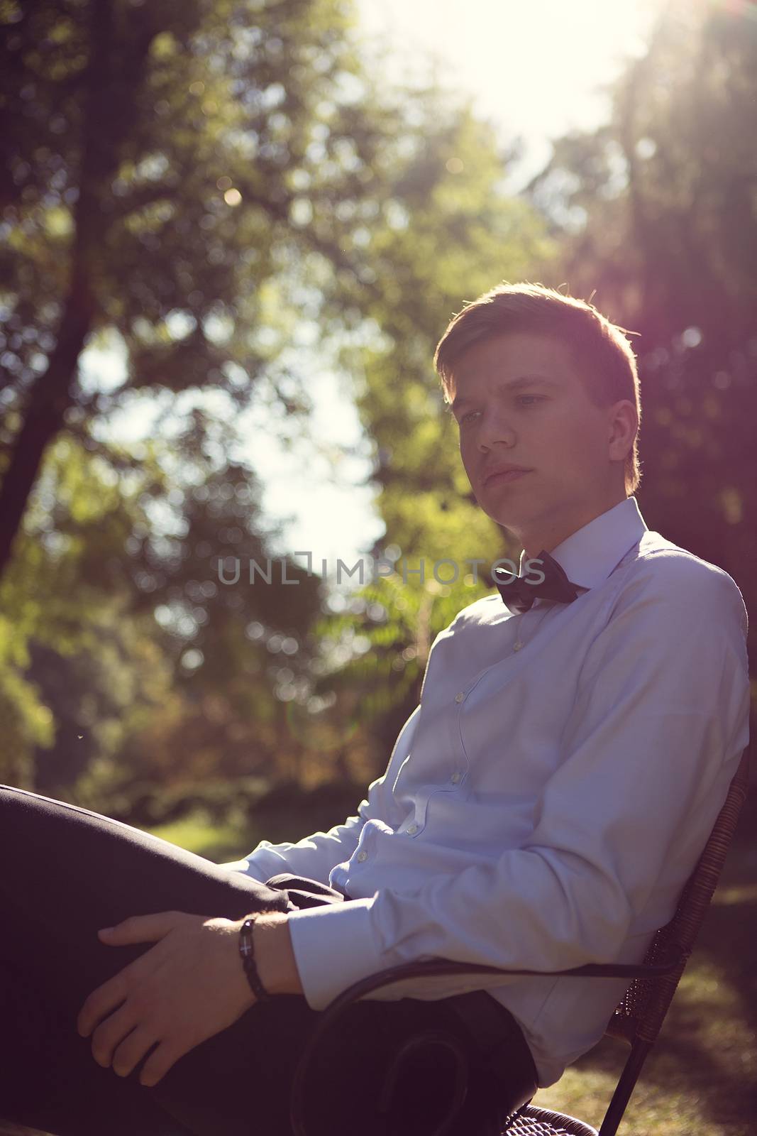 Elegant young handsome groom. Fashion portrait. by sarymsakov