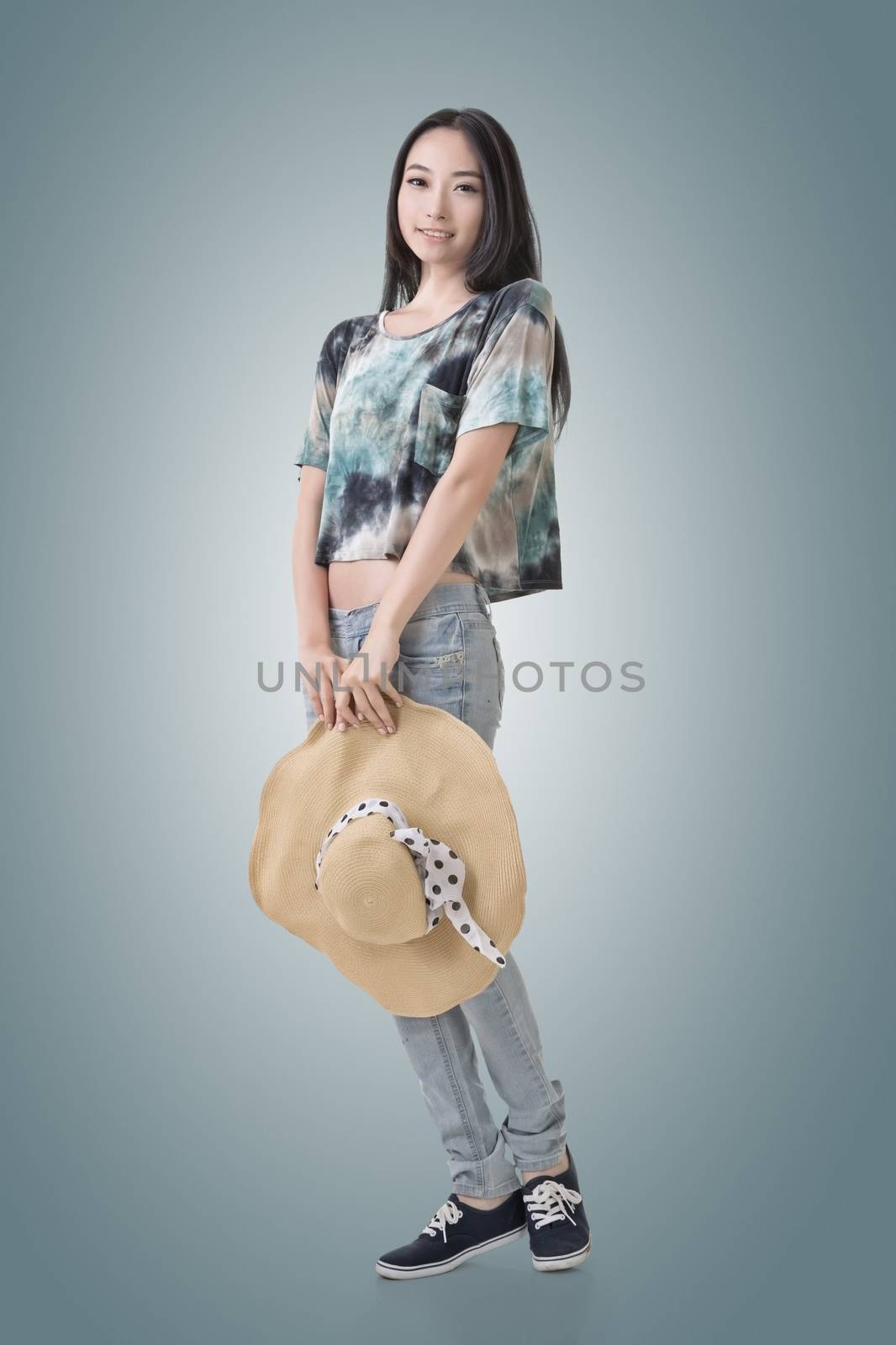 Asian beauty with hat, full length portrait isolated with clipping path.