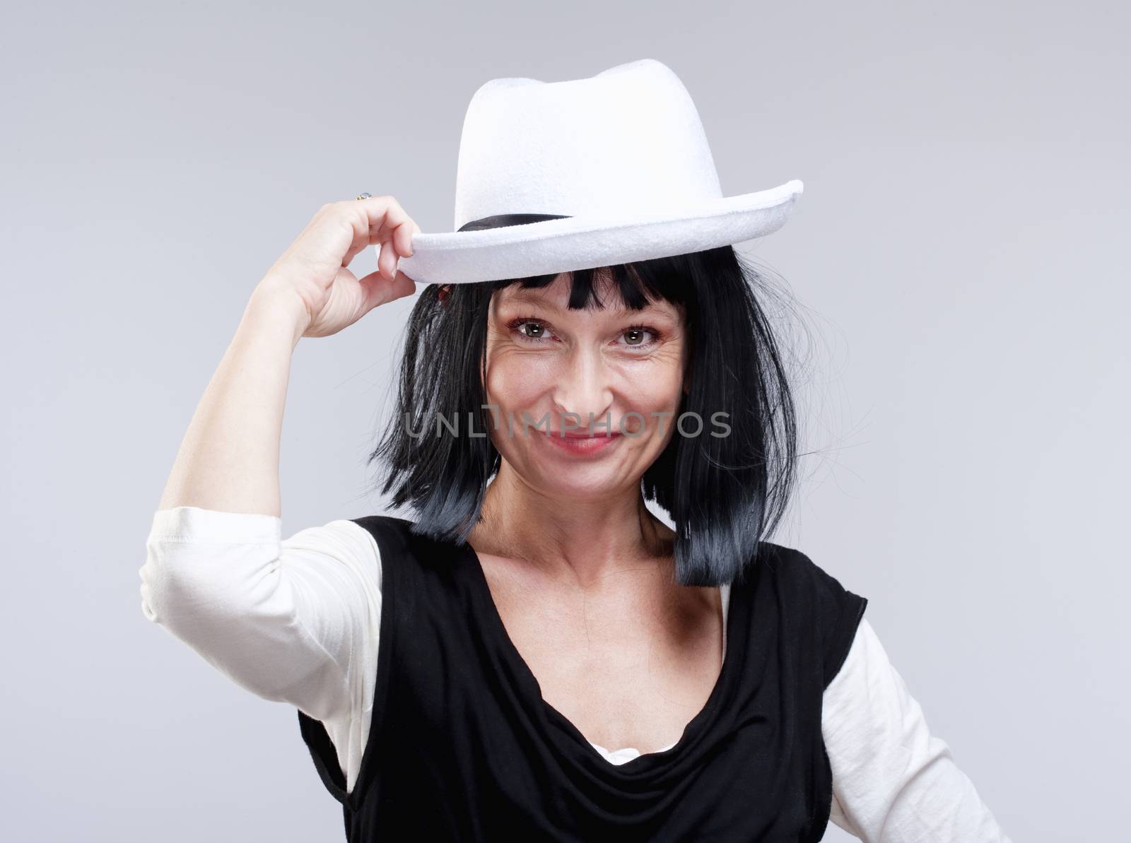 Portrait of a Woman with Black Wig and White Hat