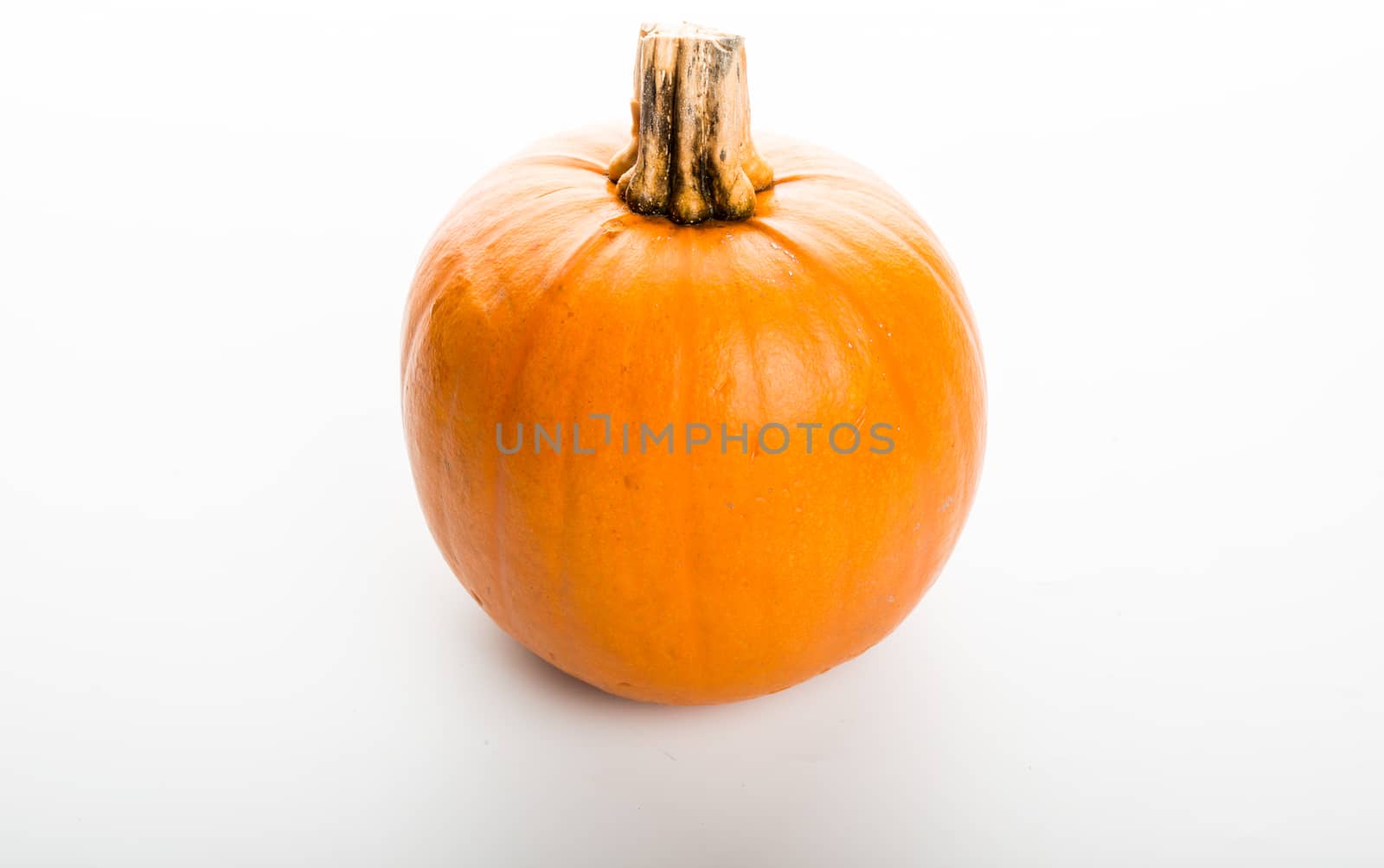 Fresh pumpkin isolated on white background