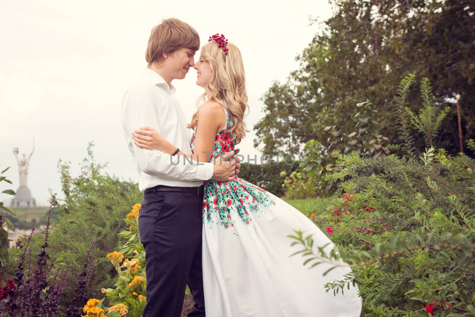 Beautiful wedding couple is enjoying wedding in the sun. 