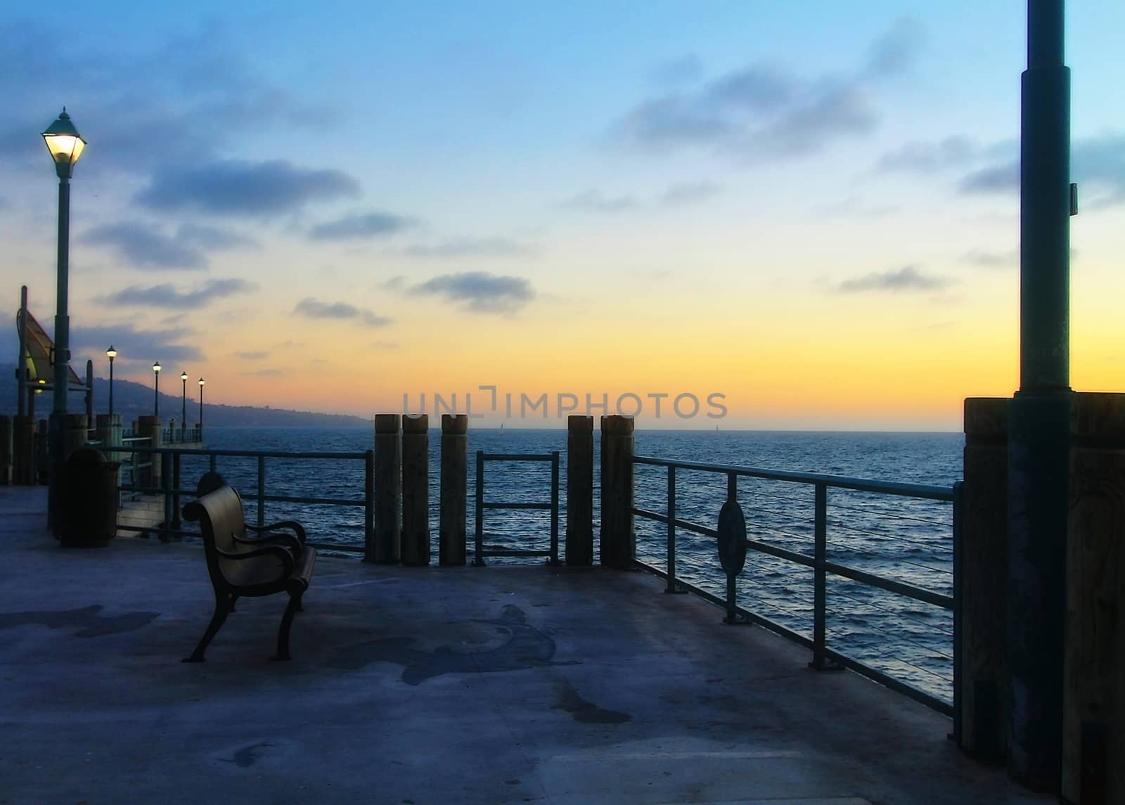 Beach pier with the sunset by Timmi