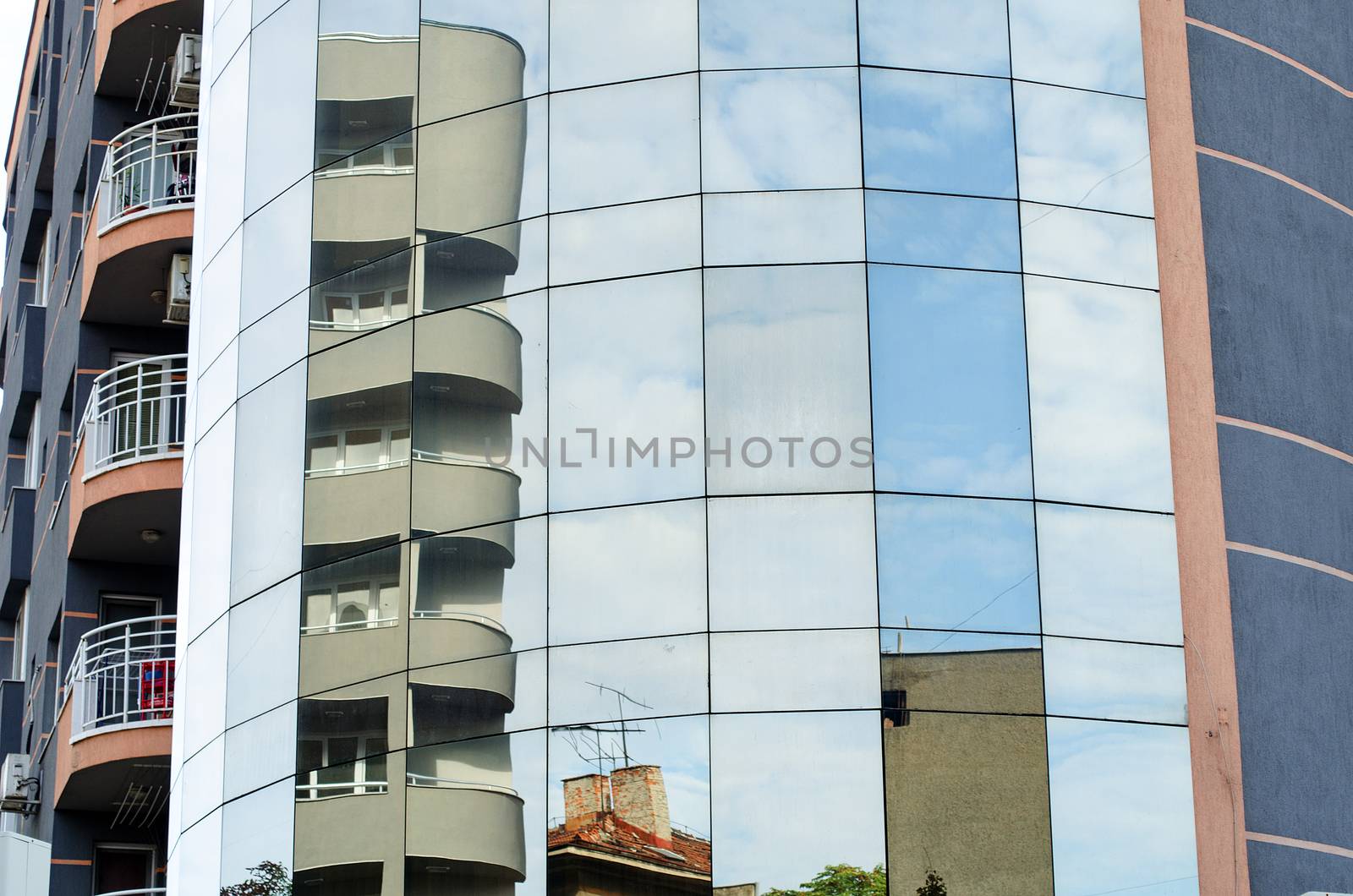 Exterior of glass residential building sunrise view