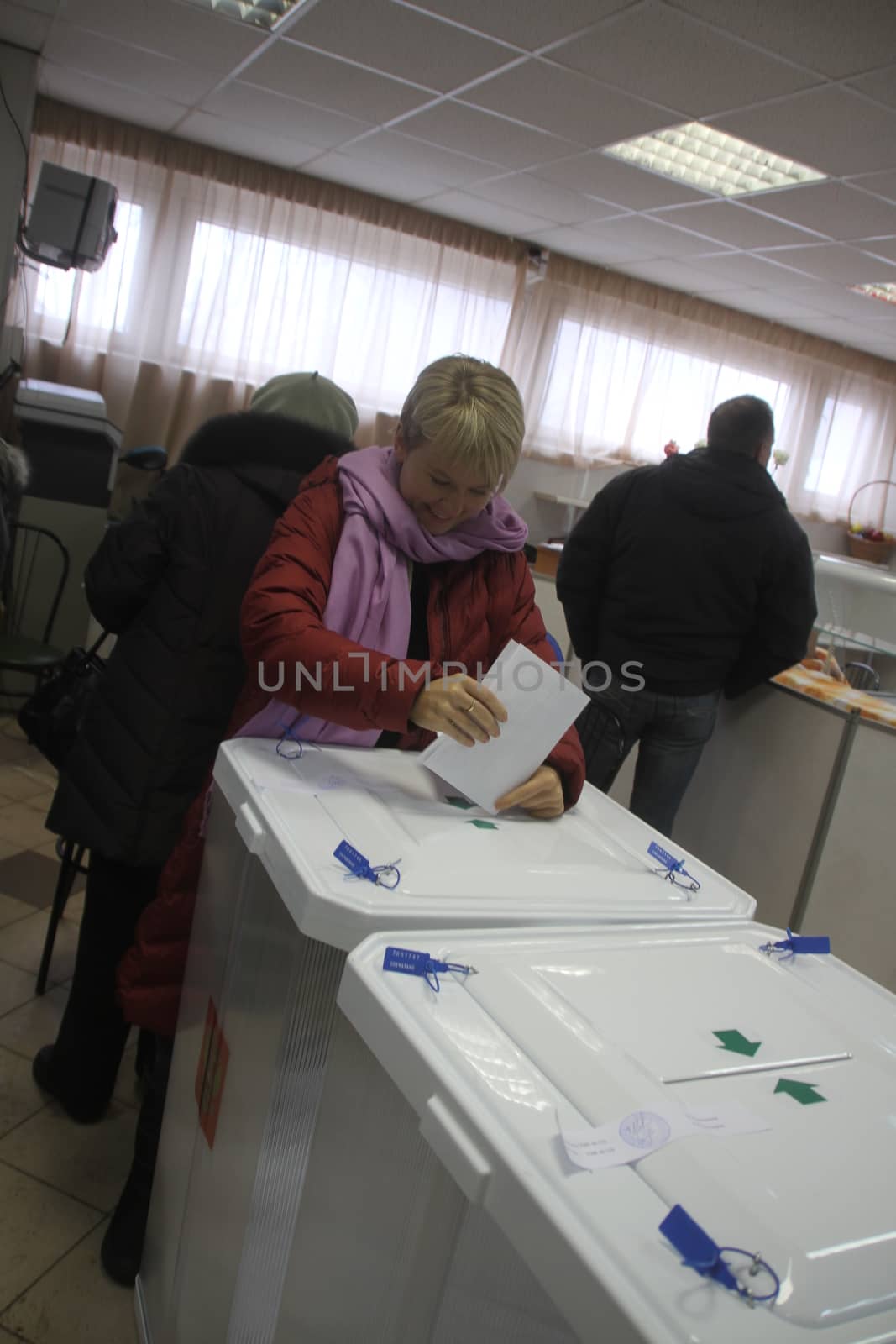 Moscow, Russia - March 4, 2012. Elections in Russia. Policies Evgeniya Chirikova votes in the elections