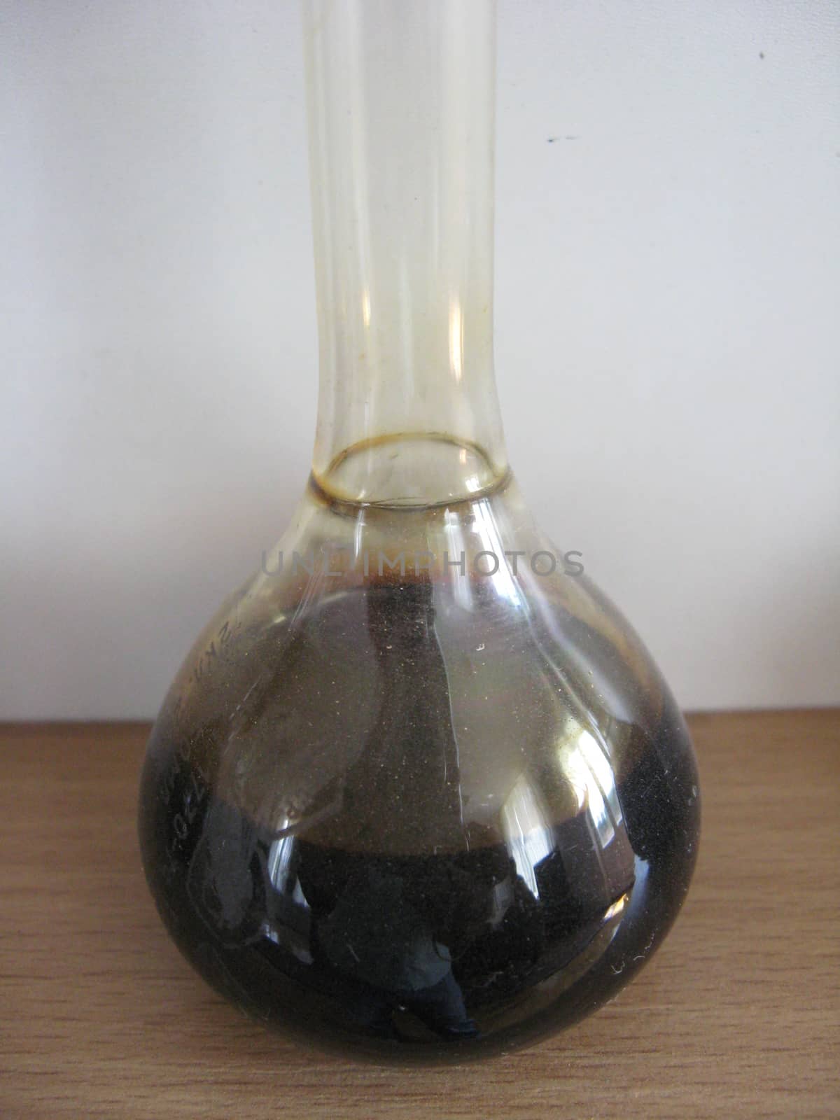 sample of oil in a flask by alexmak