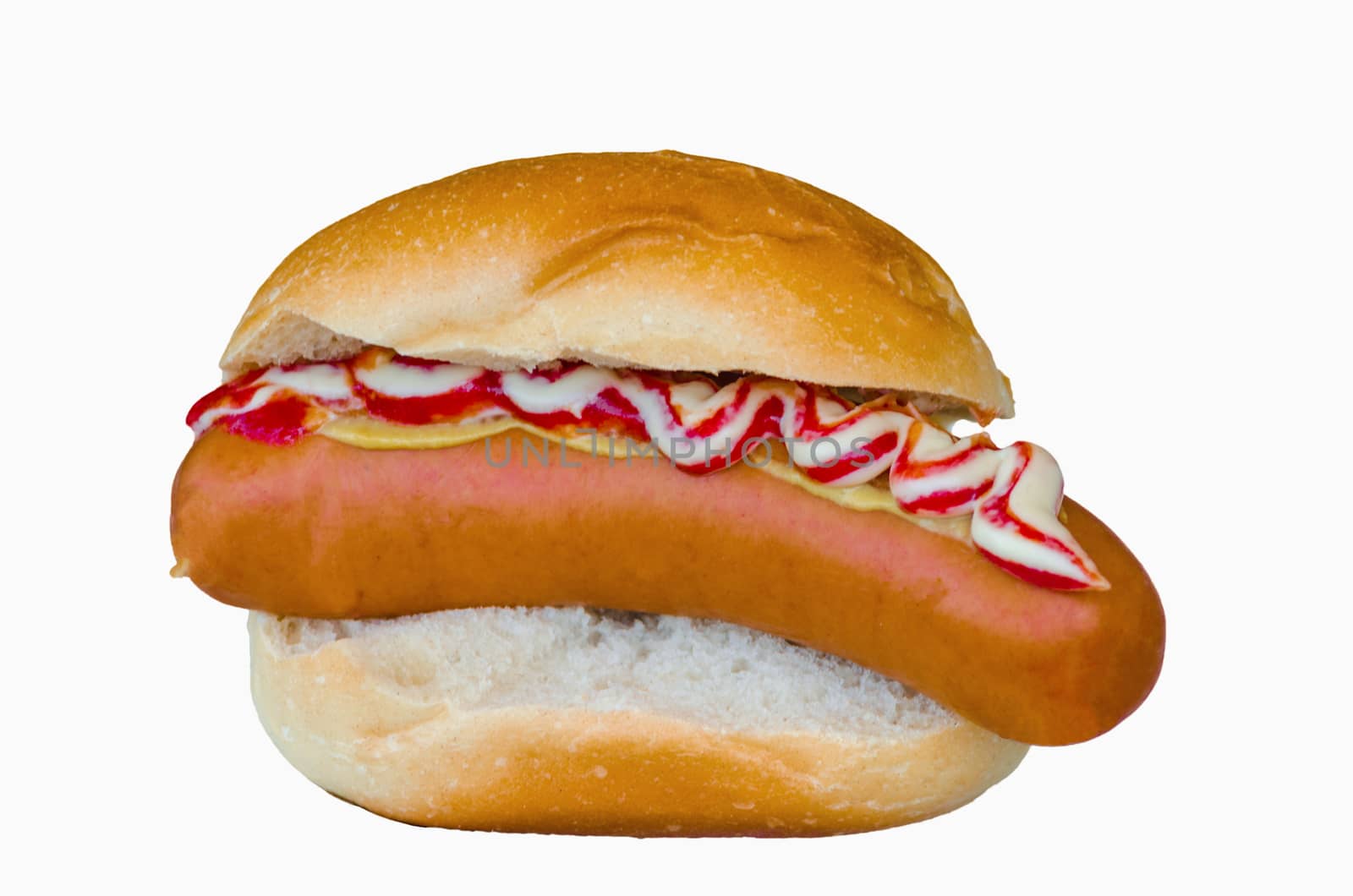 Hot dog with ketchup and mustard on a bun on a white background.