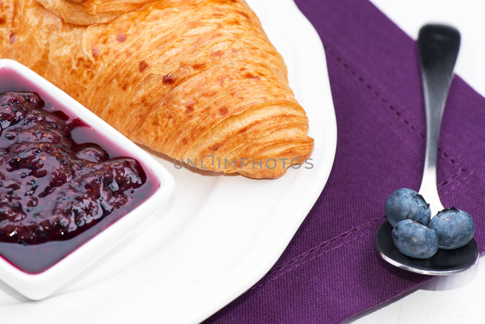 Croissant with jam and blueberry