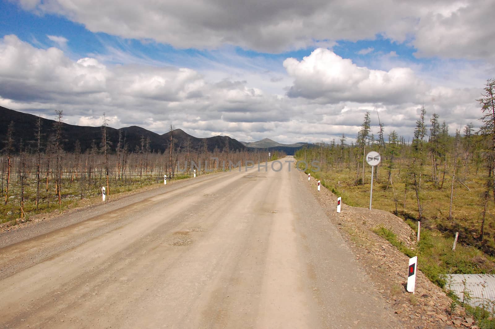 Gravel road Kolyma to Magadan highway at Yakutia