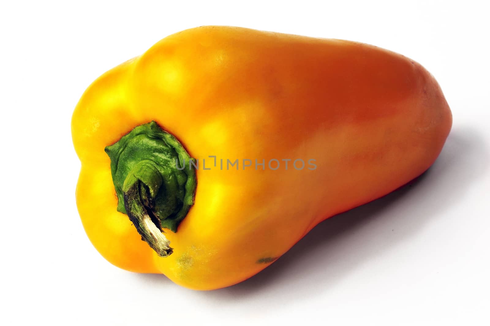 isolated on white background in studio yellow pepper