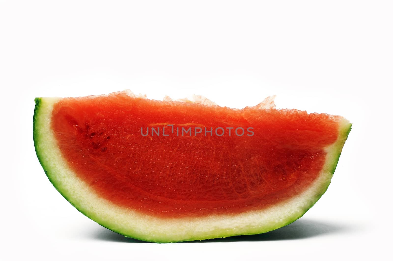 slice of watermelon isolated on white background in studio by gillespaire