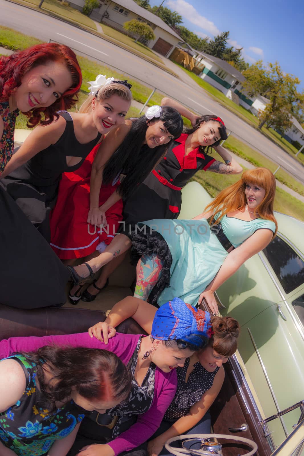 THORNCLIFF CALGARY CANADA, SEPT 13 2014: The annual Show and Shine with Pin Up Girls "Cars before 1964"