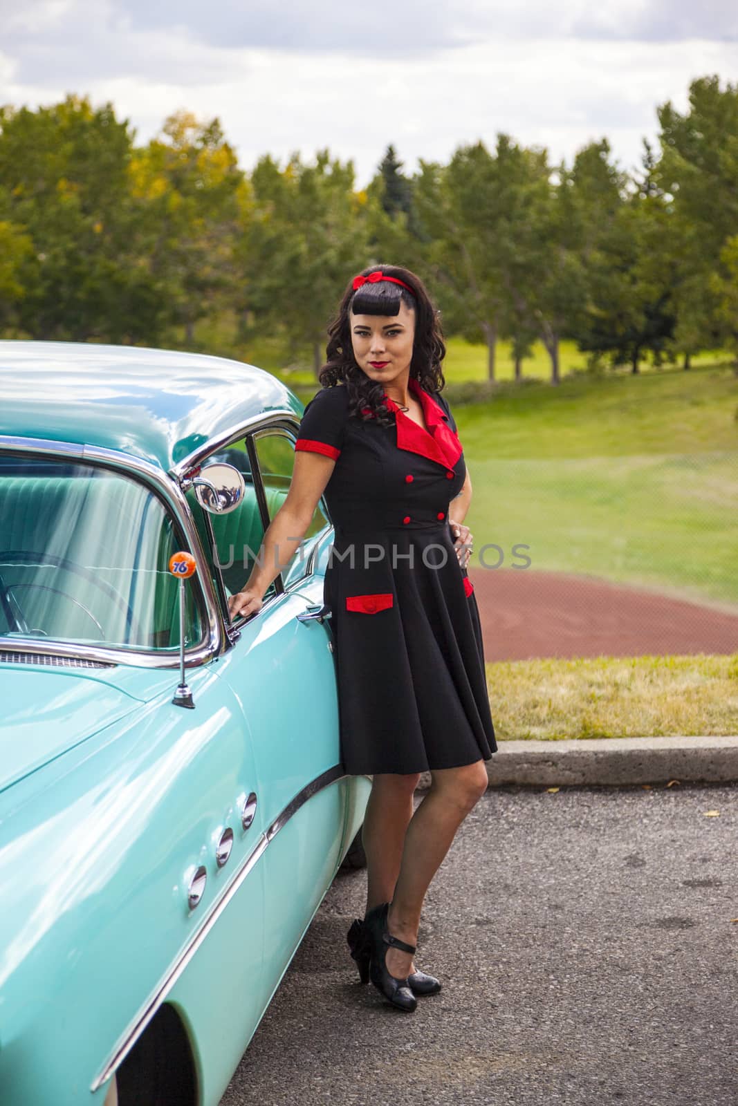 THORNCLIFF CALGARY CANADA, SEPT 13 2014: The annual Show and Shine with Pin Up Girls "Cars before 1964"