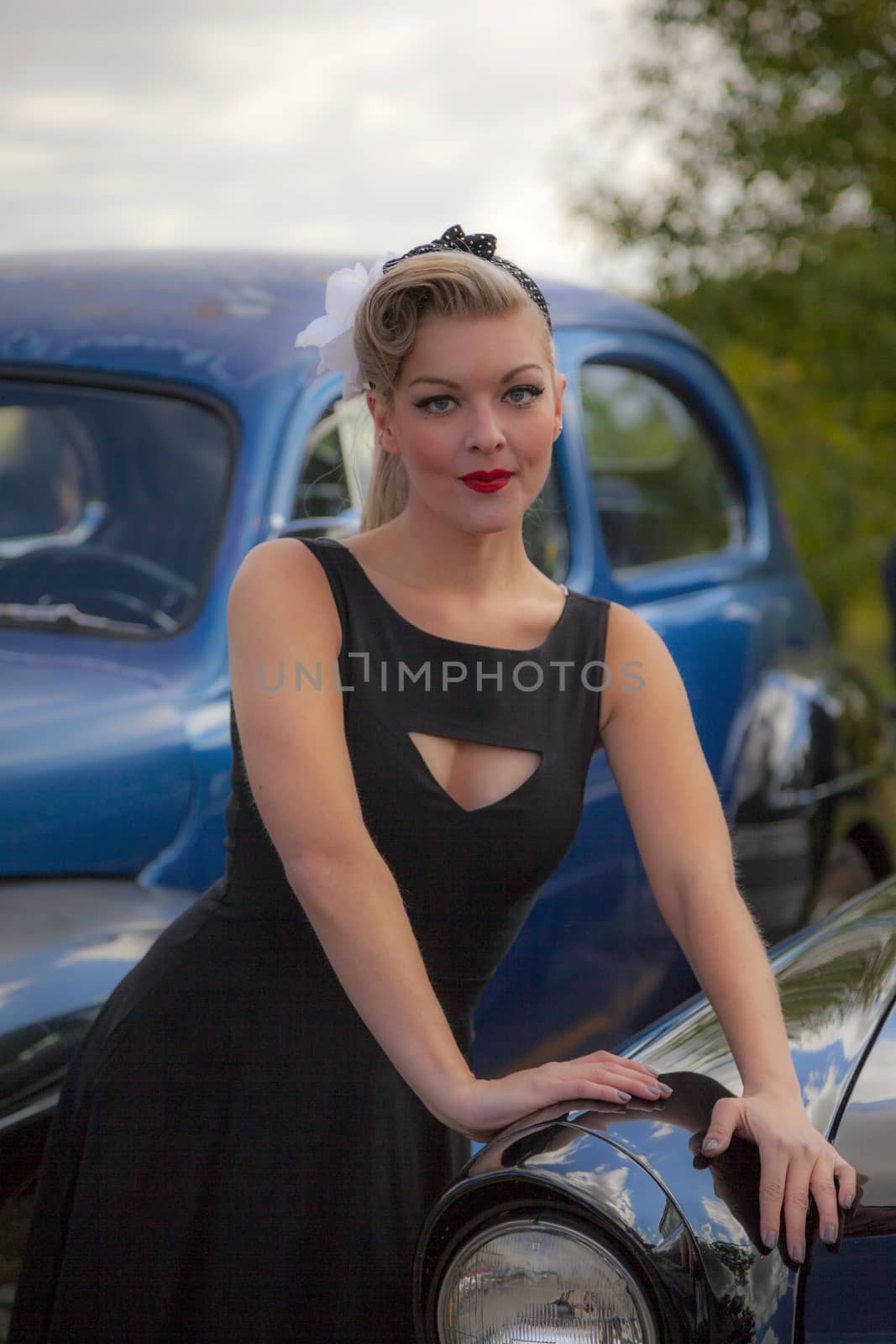 THORNCLIFF CALGARY CANADA, SEPT 13 2014: The annual Show and Shine with Pin Up Girls "Cars before 1964"