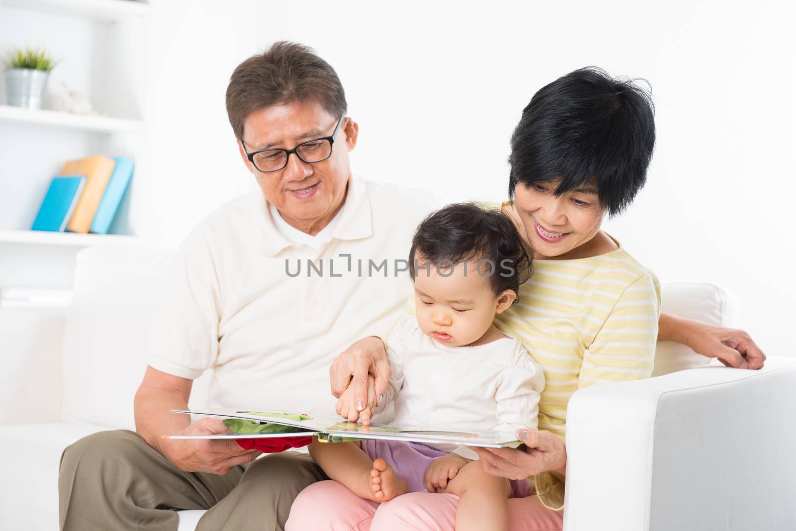 Asian family reading by szefei