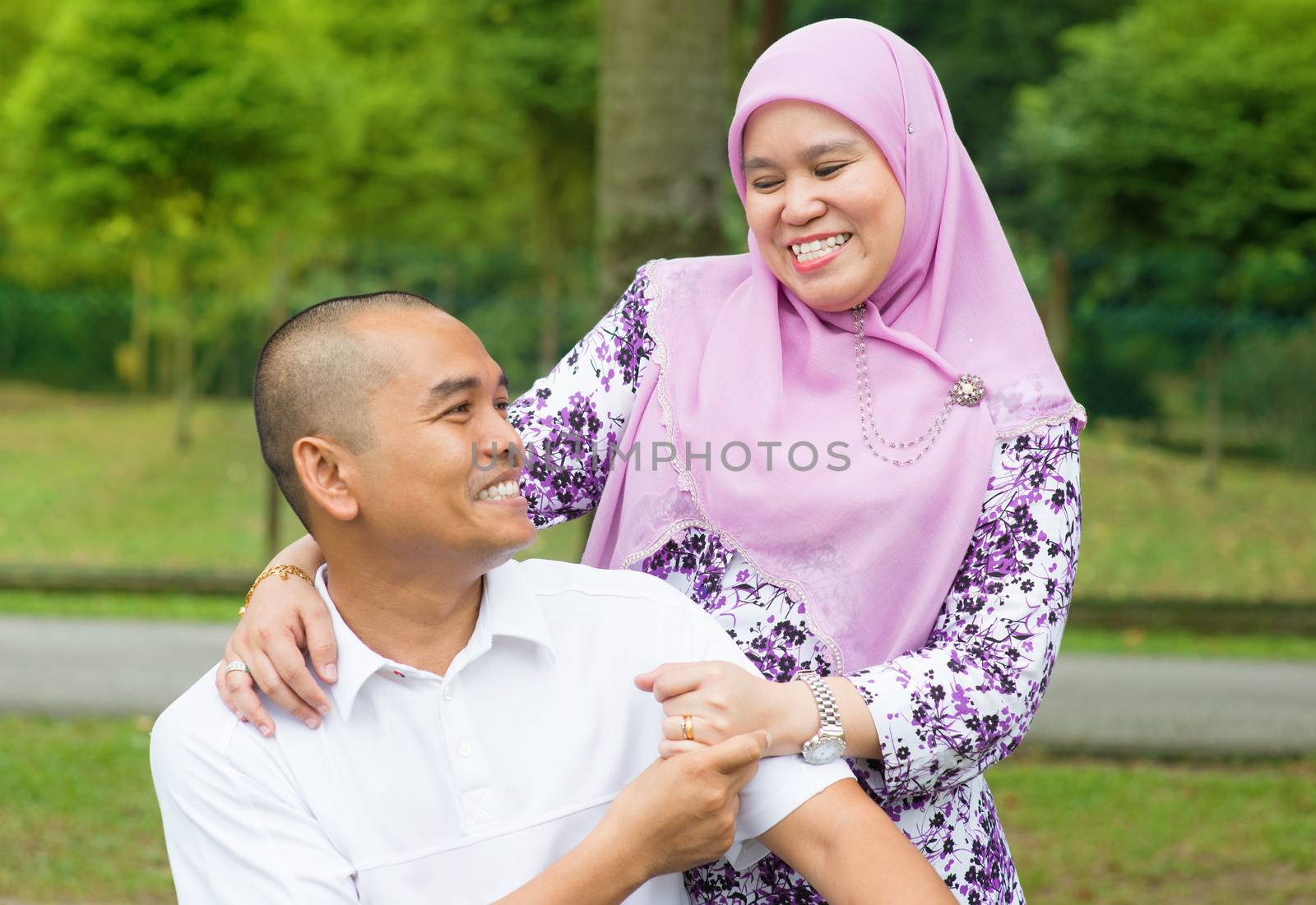 Asian Muslim couple by szefei