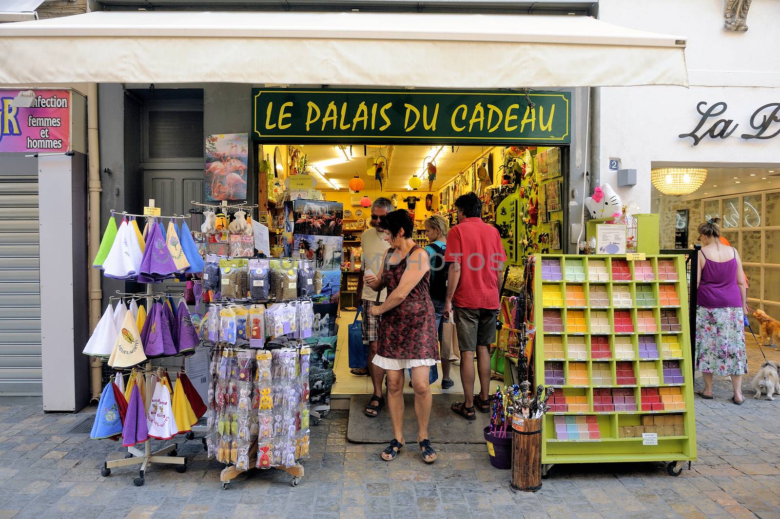 Souvenirs and gadgets in Aigues-Mortes street by gillespaire