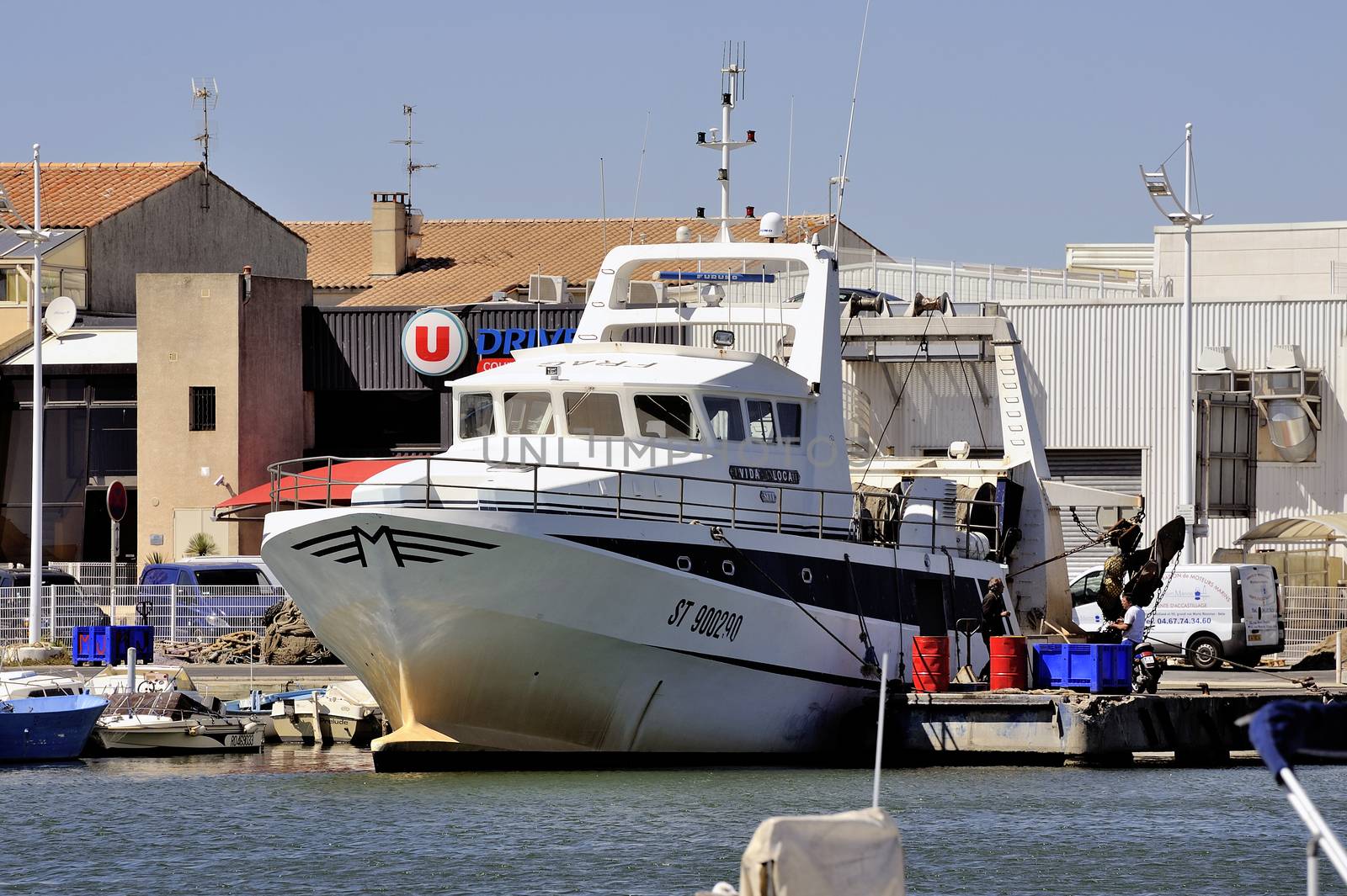 Trawler docked in the port of Le Grau-du-Roi by gillespaire