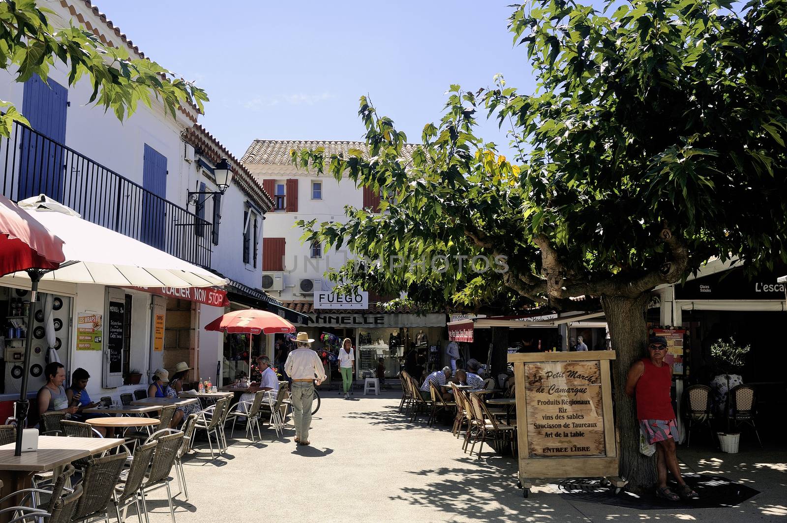 restaurants in the city center of Saintes-Maries-de-la-Mer in the summer.