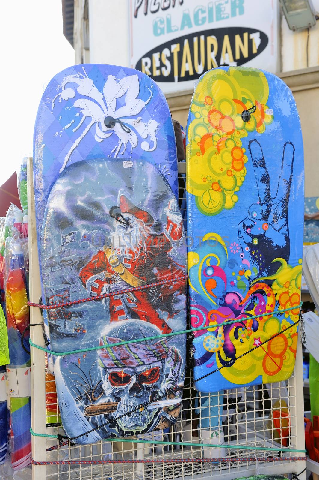 beachwear shop in the town of Saintes-Maries-de-la-Mer center during the summer season.