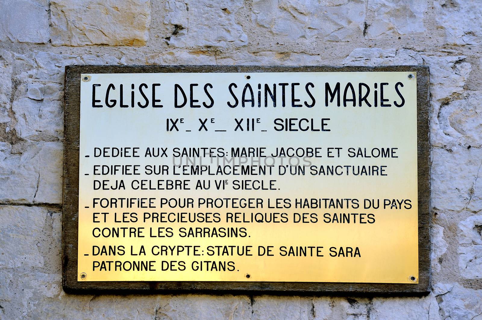 plaque explaining the history of the church of Saintes-Maries-de by gillespaire