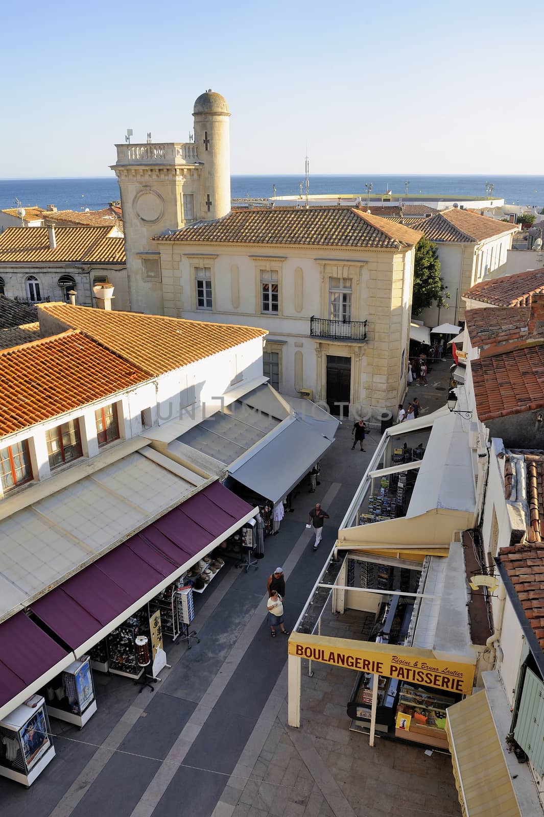 A pedestrian street of Saintes-Maries-de-la-Mer view from the roof of the church.