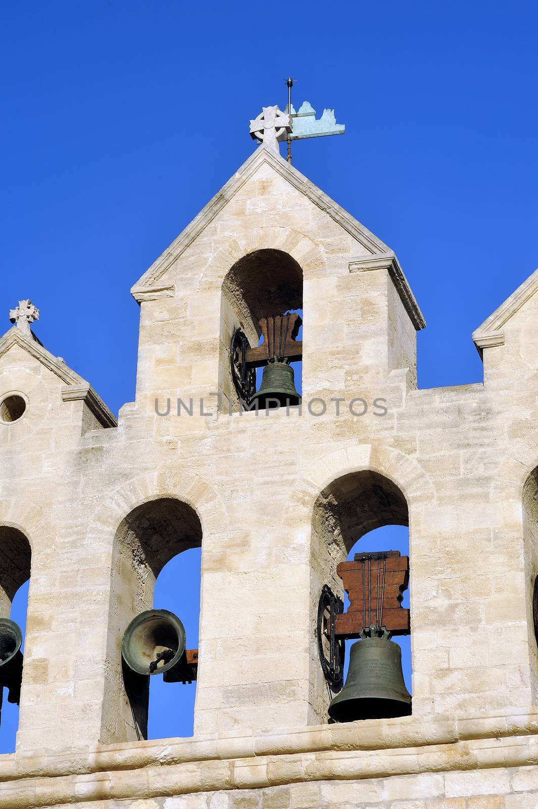 Steeple of the church of Saintes-Maries-de-la-Mer by gillespaire